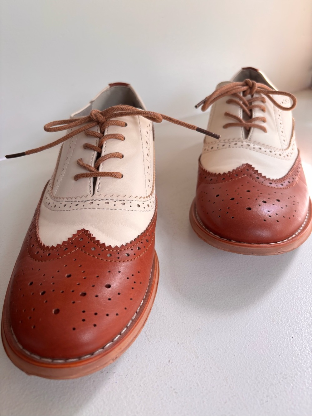 Wanted Two-Tone Brogue Saddle Oxfords in Cream and Brown